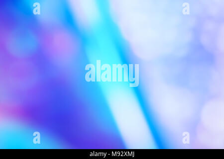 Holographic ultraviolet neon abstract unfocus background with bokeh light effect. Stock Photo