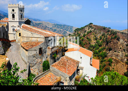 Savoca, Sicily - orange rooftops, stone walls, and Church of St. Nicholas looking to valley below. Setting for many films, most notably the Godfather Stock Photo