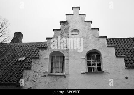 Traditional step-gabled housefronts, Walstraat, Brugge, West Flanders, Belgium.  Black and white version Stock Photo