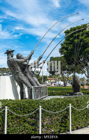 SAN DIEGO, CALIFORNIA, USA - Tunaman's Memorial  bronze sculpture of three tuna fishermen on Shelter Island in San Diego Bay. Stock Photo