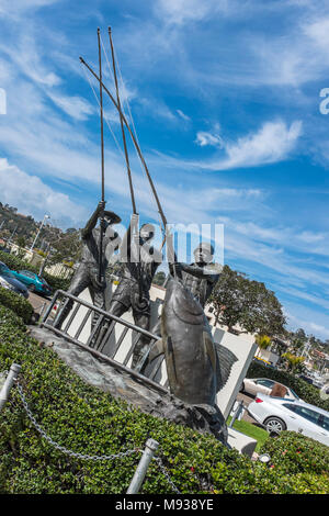 SAN DIEGO, CALIFORNIA, USA - Tunaman's Memorial  bronze sculpture of three tuna fishermen on Shelter Island in San Diego Bay. Stock Photo