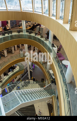 Staircases and balconies inside the modern atrium of the Central Library extension.  St. George's Quarter, Liverpool, England, UK Stock Photo