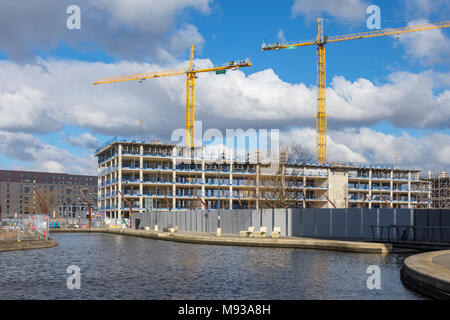 The Weavers Quay apartments block under construction, from Cotton Field Park, New Islington, Ancoats, Manchester, England, UK Stock Photo