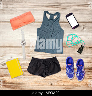 Workout Objects Sports concept. Workout objects on grey table and white background ...
