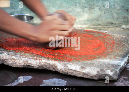 Grinding stone in India Stock Photo - Alamy