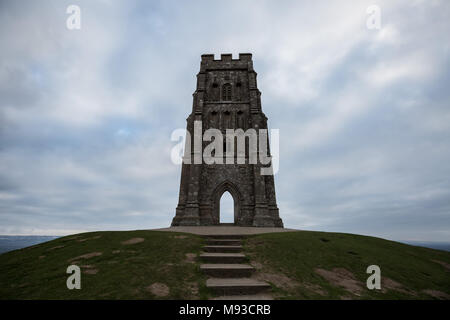 Glastonbury, UK. 20th March, 2018. Spring Equinox (or Vernal Equinox) is celebrated at dawn from the top of Glastonbury Tor. Locals and spiritualists Stock Photo