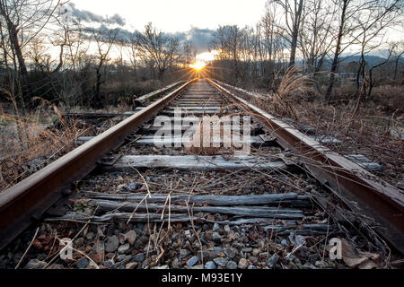 Sunset on abandoned train tracks - Brevard, North Carolina, USA Stock Photo