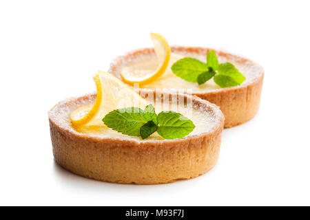 Mini  lemon tarts isolated on white Stock Photo