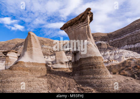 Hoodoos in the Canadian Badlands in Alberta, Canada. East of Drumheller, the Hoodoo Drive Trail (Hwy 10) is named for these oddly shaped formations. Stock Photo