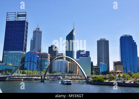 Elizabeth Quay Perth with business area behind and arcade of iconic Elizabeth Quay pedestrian bridge in the foreground Stock Photo