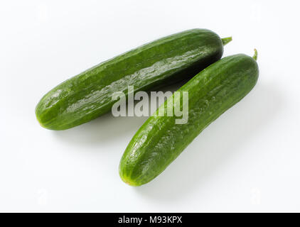 two green cucumbers on white background Stock Photo