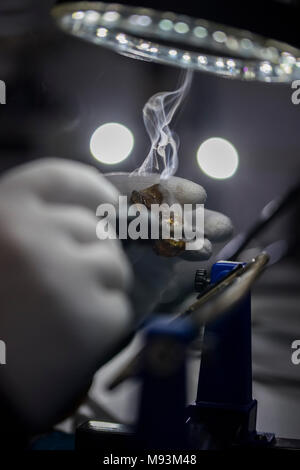 Reparing electronics devices, chips, motherboards, welding Stock Photo