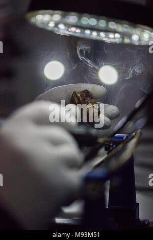 Reparing electronics devices, chips, motherboards, welding Stock Photo