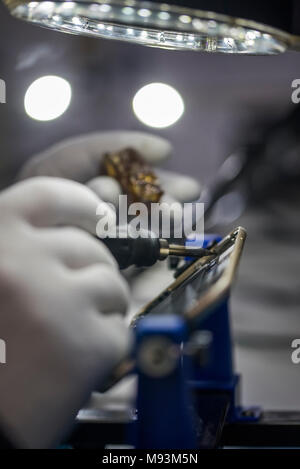 Reparing electronics devices, chips, motherboards, welding Stock Photo