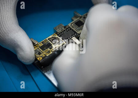 Reparing electronics devices, chips, motherboards, welding. Circuit. Stock Photo
