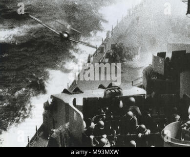 JAPANESE KAMIKAZE attack on the battleship USS MIssouri during the Battle of Okinawa on 11 April 1945. The pilot's body was recovered and the ship's Captain Callaghan ordered a burial at sea with military honors. Stock Photo