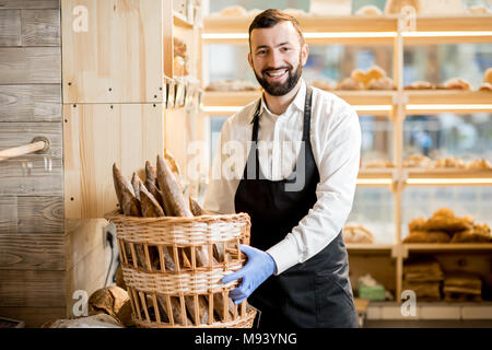 Seller in the bread store Stock Photo