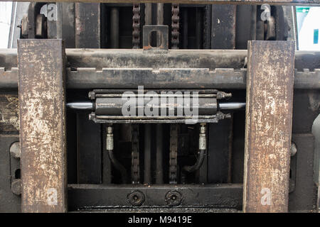 The two way hydraulic on old forklift Stock Photo