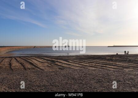 Morning Dog Walkers on the Beach at Roker, Sunderland Tyne and Wear Stock Photo