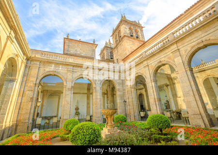 Braga, Portugal - August 12, 2017: Cathedral Treasure or Sacred Art Museum, incorporated in Braga Cathedral, the most important monument in Braga city. Perspective view of garden and the bell towers. Stock Photo