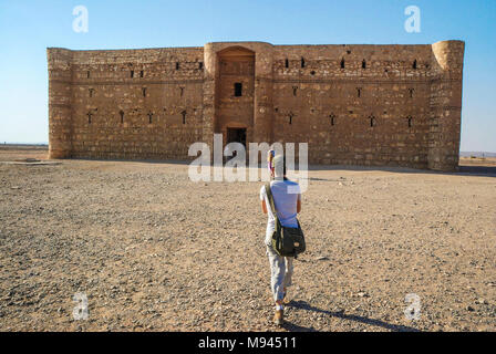 Qasr Kharana (Arabic: قصر خرّانة), sometimes Qasr al Harrana, Qasr al Kharanah, Kharaneh or Hraneh, is one of the best-known of the desert castles located in present-day eastern Jordan, about 60 kilometres (37 mi) east of Amman and relatively close to the border with Saudi Arabia. It is believed to have been built sometime before the early 8th century AD, based on a graffito in one of its upper rooms, despite visible Sassanid influences. A Greek or Byzantine house may have existed on the site. It is one of the earliest examples of Islamic architecture in the region.  Its purpose remains uncle Stock Photo