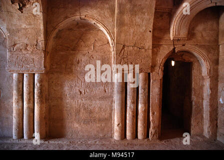 Qasr Kharana (Arabic: قصر خرّانة), sometimes Qasr al Harrana, Qasr al Kharanah, Kharaneh or Hraneh, is one of the best-known of the desert castles located in present-day eastern Jordan, about 60 kilometres (37 mi) east of Amman and relatively close to the border with Saudi Arabia. It is believed to have been built sometime before the early 8th century AD, based on a graffito in one of its upper rooms, despite visible Sassanid influences. A Greek or Byzantine house may have existed on the site. It is one of the earliest examples of Islamic architecture in the region.  Its purpose remains uncle Stock Photo