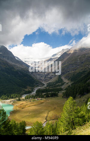 Bernina Railway links St. Moritz, Switzerland, with the town of Tirano, Italy, via the Bernina Pass Stock Photo