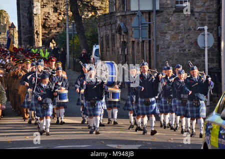 Representatives of the Madras School / college bagpipe band of St Andrews at a remembrance day parade in St Andrews Fife Stock Photo