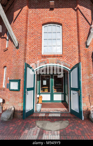 Wide angle view on the entrance to the Homeland Museum in the Pelde Mill in Esens. Stock Photo