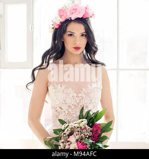 Glamorous Woman Fashion Model with Makeup and Flowers Stock Photo