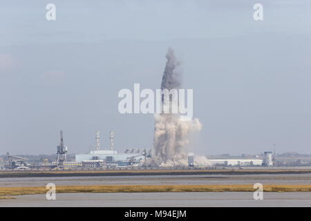 The chimney stack at Uniper's decommissioned, Kingsnorth Power Station, in Hoo, Rochester, Kent, which stands at twice the height of Big Ben, is demolished in a controlled explosion. Stock Photo