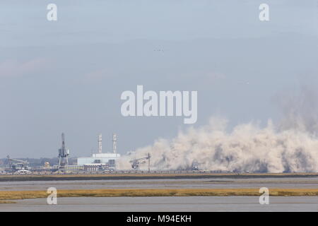 The chimney stack at Uniper's decommissioned, Kingsnorth Power Station, in Hoo, Rochester, Kent, which stood at twice the height of Big Ben, is demolished in a controlled explosion. Stock Photo