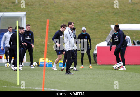 England Manager Gareth Southgate (centre) during a training session at St Georges' Park, Burton. Stock Photo