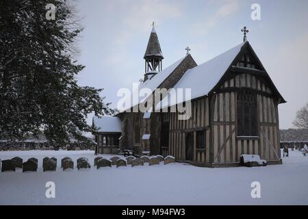 All Saint's Church, Crowfield, Suffolk, in the Snow Stock Photo