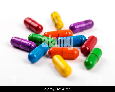 colorful pills isolated on white background Stock Photo