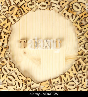 The inscription in wooden letters. From the letters make the text. The view from the top. Stock Photo