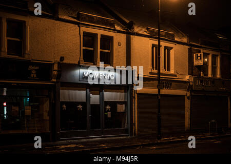 A night view of the Momento restaurant on Northfield Avenue in Ealing. From a series of pictures of the streets of Ealing during a cold snap in London Stock Photo