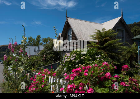 pretty old Victorian houses Akaroa South Island New Zealand Stock Photo