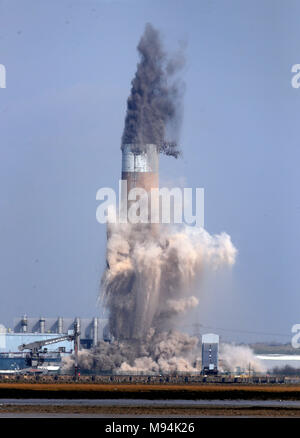 The chimney stack at Uniper's decommissioned, Kingsnorth Power Station, in Hoo, Rochester, Kent, which stands at twice the height of Big Ben, is demolished in a controlled explosion. Stock Photo