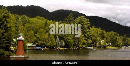 Old Forge, New York, USA. 27th Aug, 2015. A small lighthouse anchors a point on First Lake in Old Forge, New York. Credit: L.E. Baskow/ZUMA Wire/Alamy Live News Stock Photo