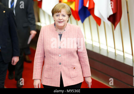 Brussels, Belgium. 23rd Mar, 2018. German Chancellor Angela Merkel leaves EU headquarters after the first-day of spring EU Summit at EU headquarters in Brussels, Belgium, early on March 23, 2018. Credit: Ye Pingfan/Xinhua/Alamy Live News Stock Photo