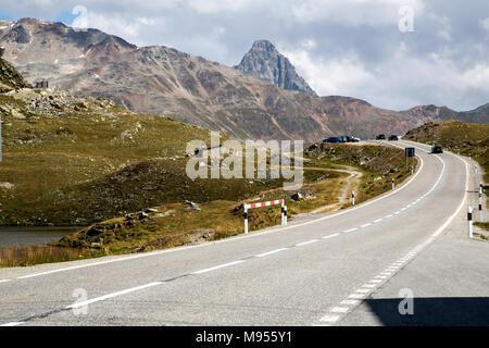 Bernina Railway links St. Moritz, Switzerland, with the town of Tirano, Italy, via the Bernina Pass Stock Photo