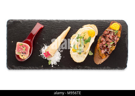 Tasty appetizer sauce herbs served isolated board Stock Photo