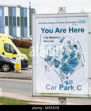 Royal Stoke Hospital You Are Here sign with ambulance and buildings in the background Stock Photo