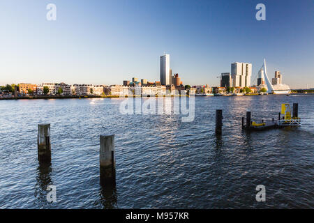 ROTTERDAM, NETHERLANDS - MAY 25, 2017: Exterior view of the Erasmus Bridge at sunset and the Maas River on May 25, 2017. The bridge is named after Des Stock Photo