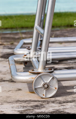 Rusty iron wheel base of iron structure Stock Photo