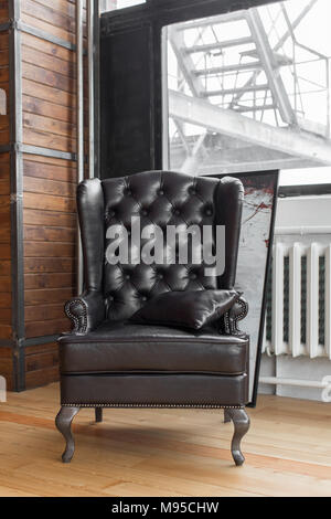 The classic armchair that stands in the studio Stock Photo
