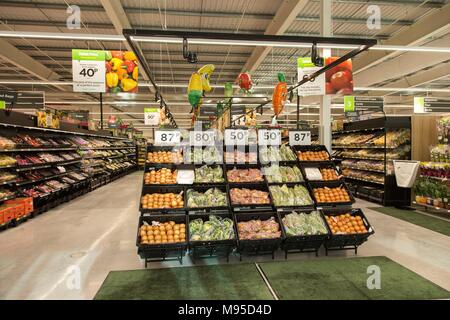 Full racks of fresh fruit, vegetables, produce in an Asda supermarket. Stock Photo