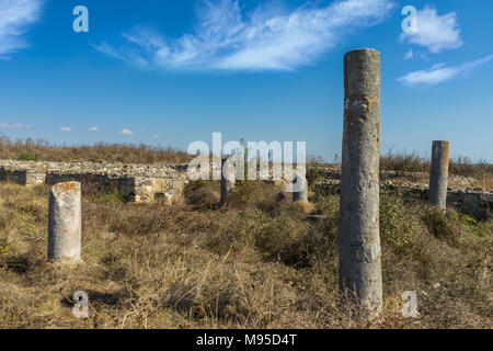 ruins of stone walls and columns of ancient castle Histria, Romania Stock Photo