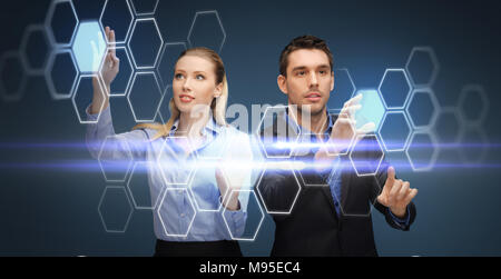 business people with virtual projection of network Stock Photo
